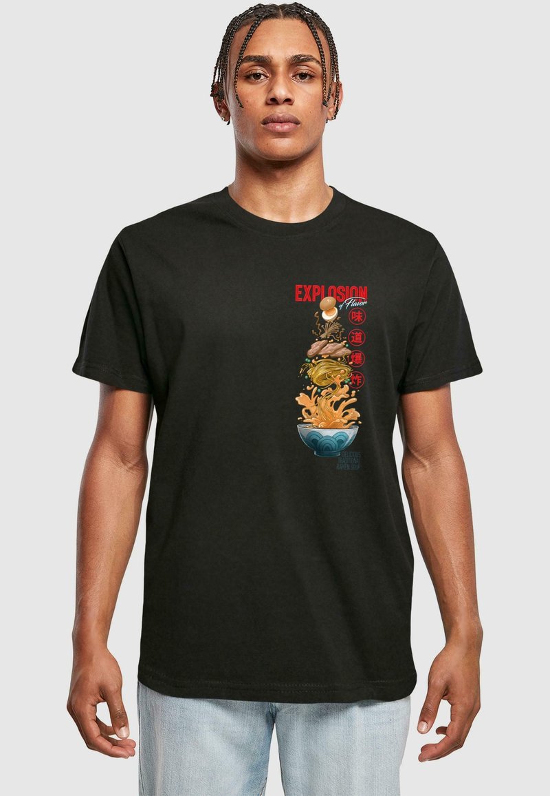 Black cotton t-shirt featuring colorful graphics of a bowl with food, text reading "EXPLOSION," and Asian motifs. Short sleeves and crew neck.