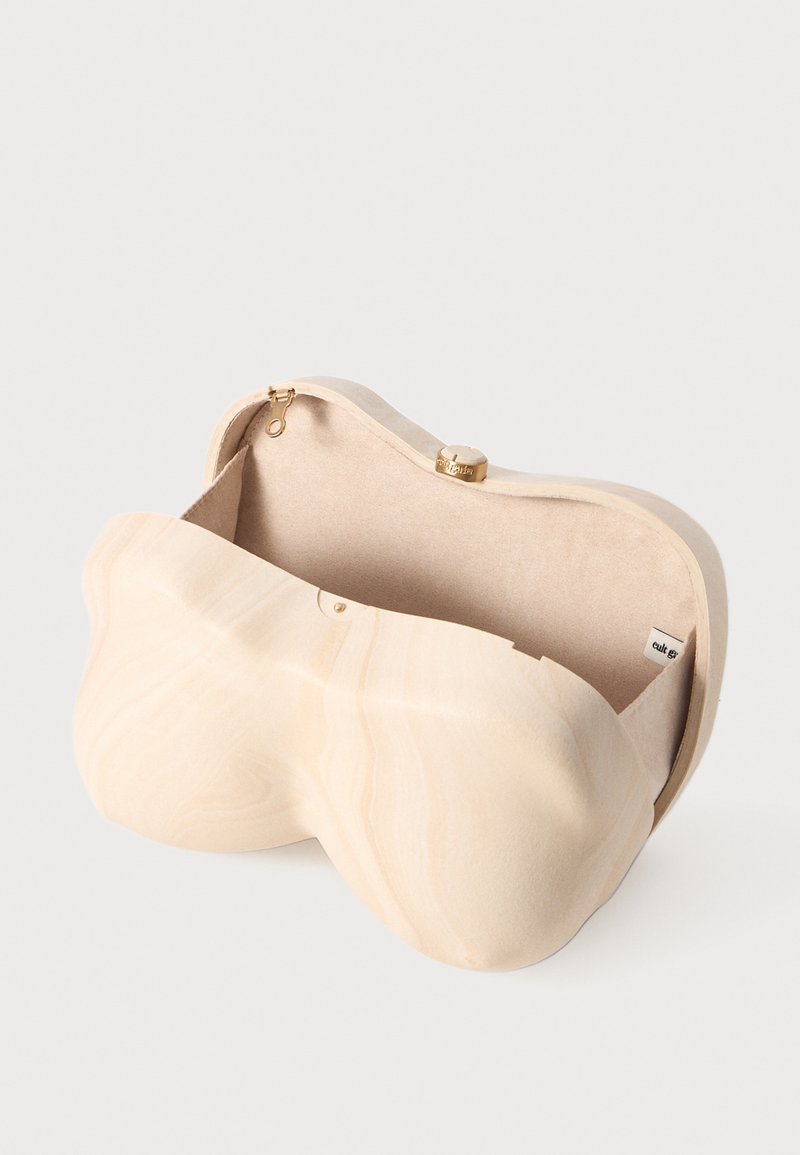 Beige wooden clutch with a smooth, curved shape. Interior lined with soft fabric, featuring a discreet logo tag and a gold-tone clasp.