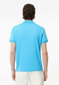 Lacoste Piké - bleu iy