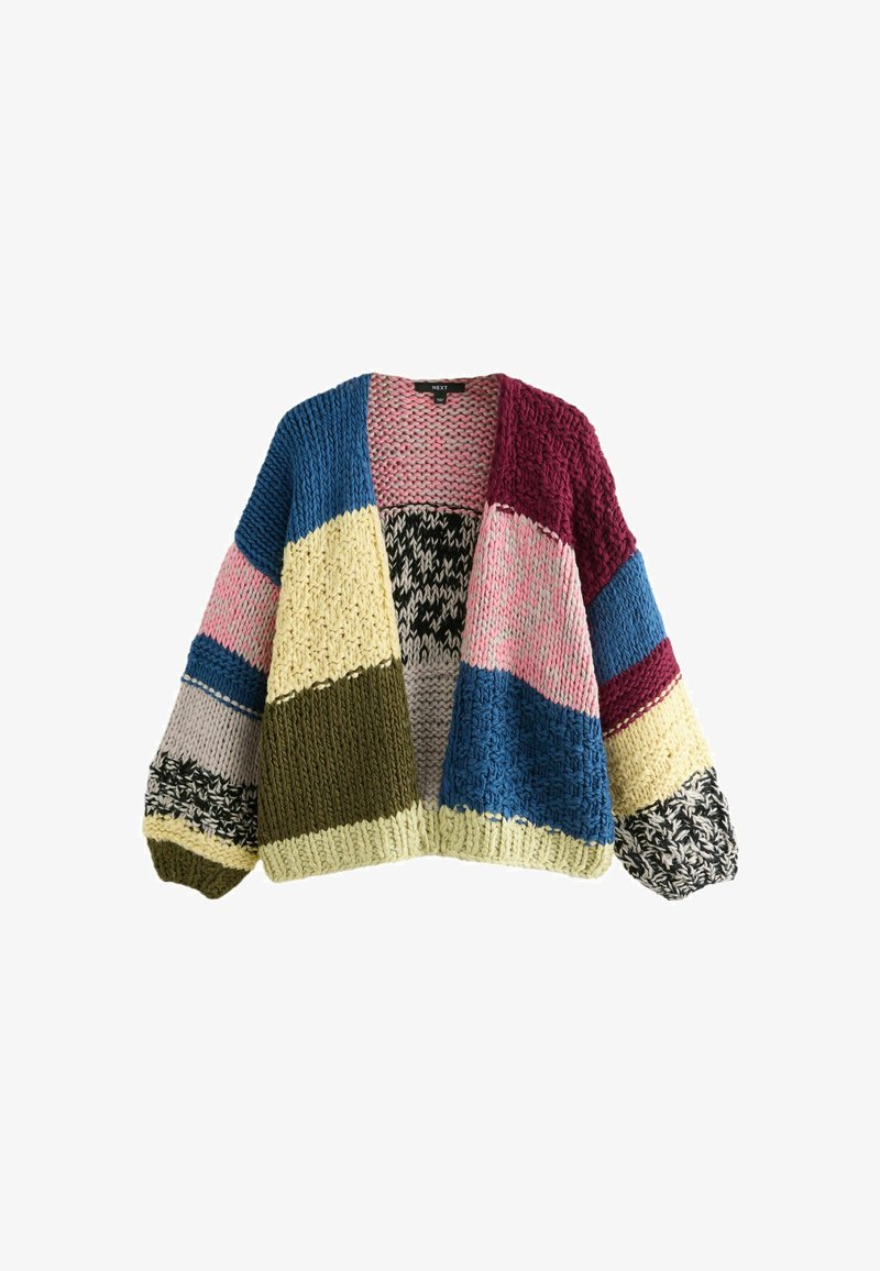Cardigan en tricot épais avec un design en patchwork arborant des couleurs bleu, bordeaux, rose, jaune, olive et noir, avec des manches oversize et une coupe ouverte.