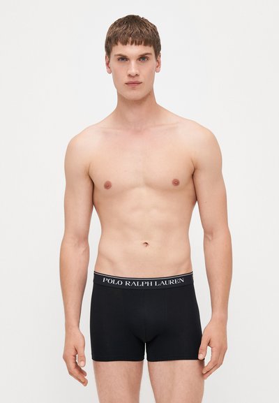 Μαύρα βαμβακερά μποξεράκια με ελαστική μέση, που φέρουν το λογότυπο "POLO RALPH LAUREN" σε λευκό. Λείο υλικό, εφαρμοστό σχέδιο.