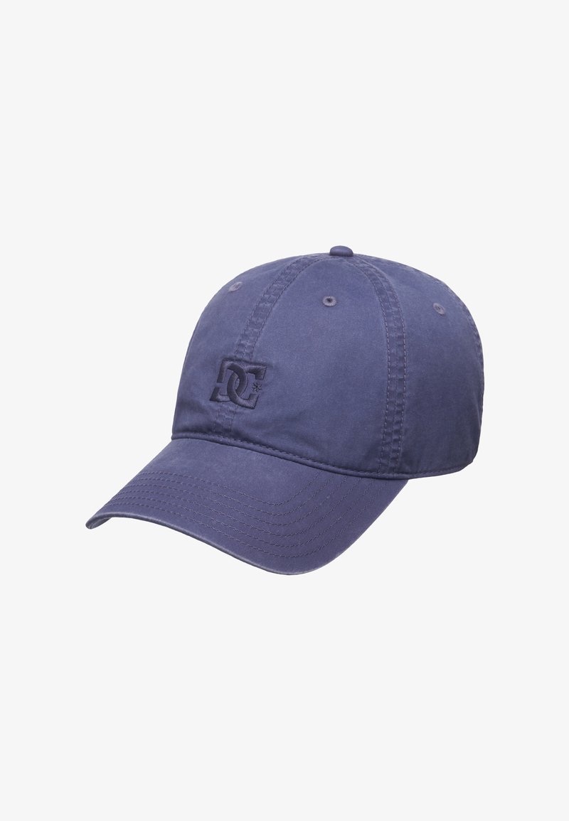 Navy blue baseball cap made of textured fabric, featuring a stitched logo on the front and six ventilation eyelets. Curved peak design.
