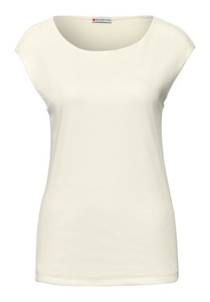 Haut sans manches pour femme de couleur crème avec un col rond et de petites manches étendues, étiqueté Street One.