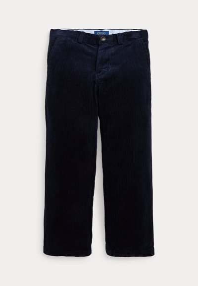 Pantalones de pana azul marino con textura de ribete vertical, que cuentan con un cierre de botón y trabillas para cinturón. Diseño de pierna recta, ajuste casual.