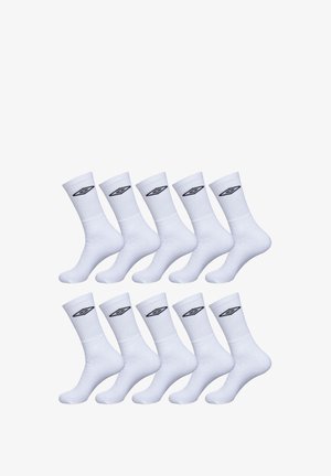 Chaussettes blanches en coton avec un poignet côtelé et un logo noir sur le côté. Paquet de 12 avec une texture douce et une longueur standard de tige.