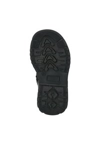 Suela de zapato de goma negra con un patrón texturizado, que presenta formas geométricas elevadas y una zona central sólida con bordes planos.