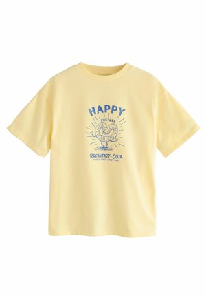 Yellow cotton t-shirt with short sleeves, featuring a blue graphic print of a pretzel and text "HAPPY PRETZEL BREAKFAST-CLUB."