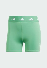 Gröna sportshorts av elastiskt material med bred midjeresår, vita trekantiga logodetaljer och sydda sömmar.