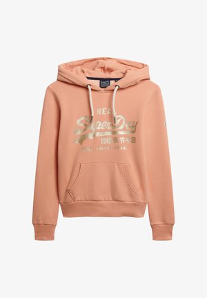 Hoodie en pêche avec cordon de serrage, poche avant et logo doré imprimé. Fabriqué en tissu doux, avec des poignets et un ourlet côtelés pour plus de confort.