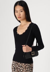 Vero Moda VMMILY V NECK - Ilgarankovis viršutinės dalies drabužis - black