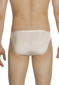 Beige Herrenunterhosen von hinten, mit einer glatten Textur, elastischem Bund und minimaler Abdeckung in klassischem Design.