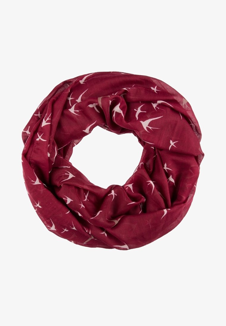 Écharpe infinie rouge avec des silhouettes blanches d'oiseaux imprimées sur le tissu, disposées en boucle circulaire.