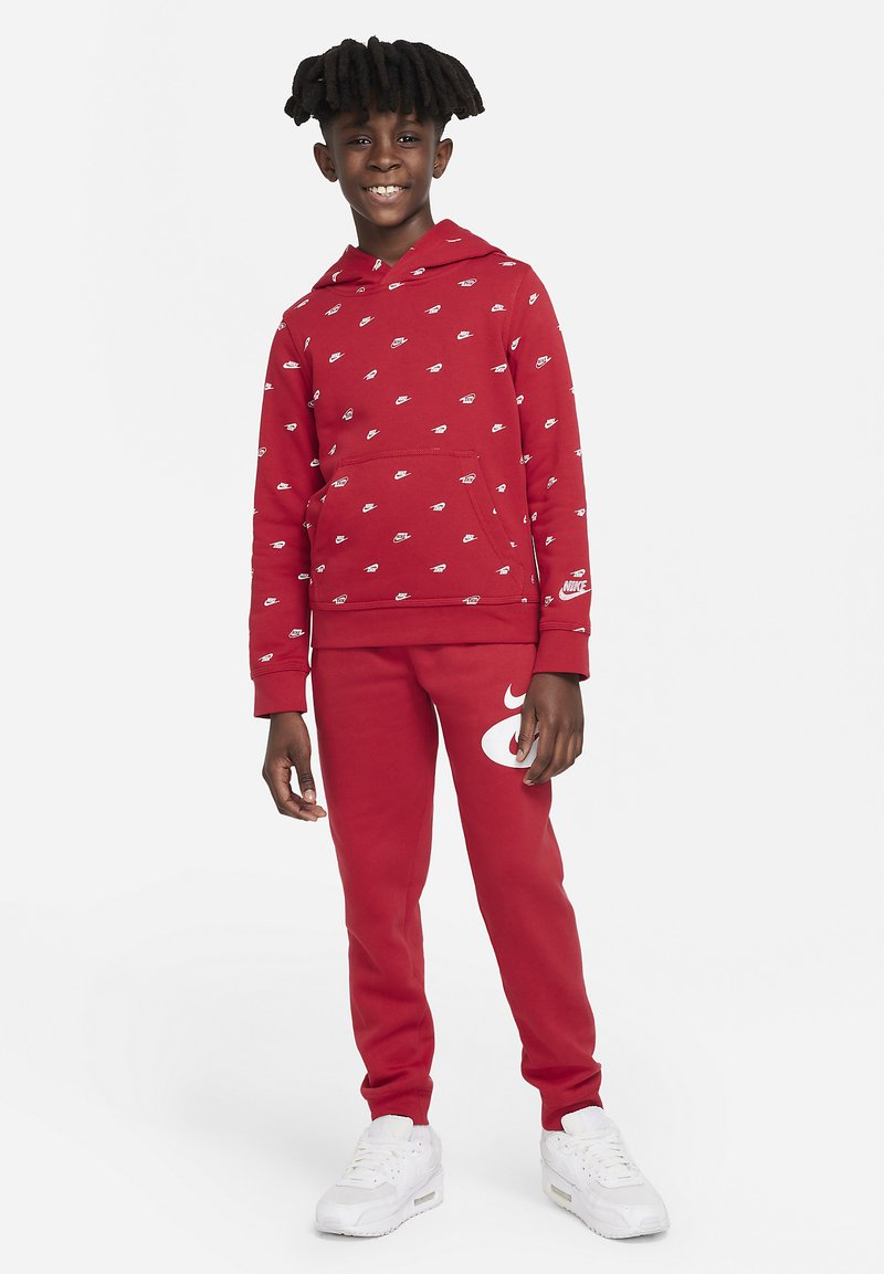 Nike Sportswear CORE Tracksuit bottoms gym red/(white)/red Zalando.de