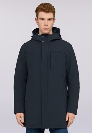 Veste à capuche bleu marine avec fermeture éclair sur le devant et boutons-pression, dotée de quincaillerie discrète, de poches latérales et d'un design minimaliste.