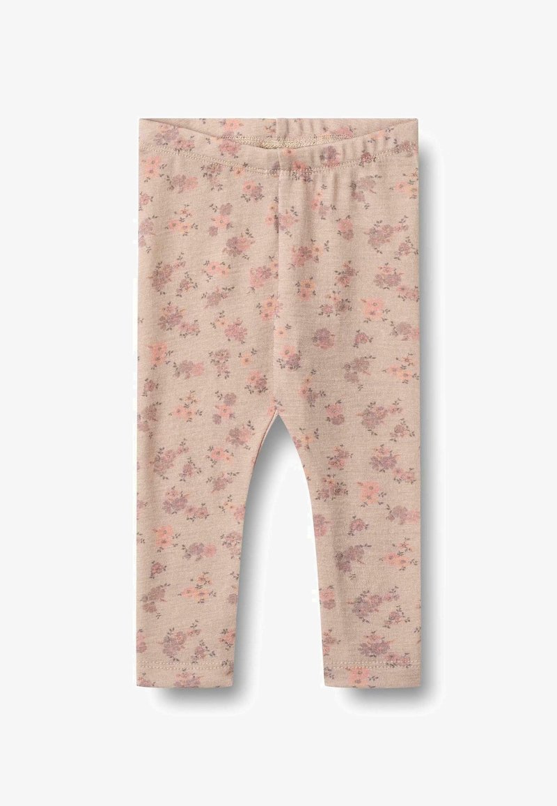 Lillebees lilledesainiga leggings pehmes beežis kangas, kus on õrnad roosa ja lilla lillemustrid, koos elastse talje ja mugava istuvusega.