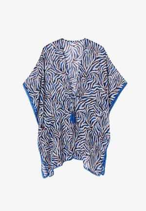 Schlanker, weiter Kaftan mit blauen, schwarzen und weißen Zebrastripes, blaue Quastenbindeband vorne und blauer Bommelverzierung an den Kanten.