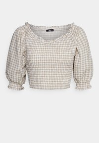 Blusa curta com decote quadrado, mangas bufantes e textura franzida. Apresenta um padrão xadrez em bege claro e branco.