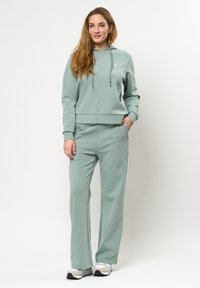 U.S. Polo Assn. GITA  - Treniņtērpa apakšdaļas - green milliue