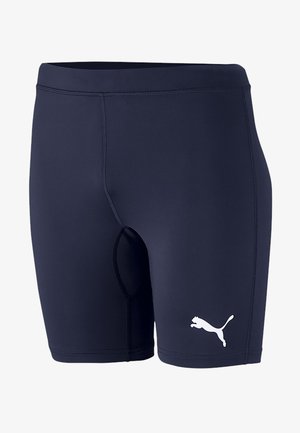 Marineblaue, körpernahe Shorts mit einem elastischen Bund, aus dehnbarem Material gefertigt, mit einem weißen Puma-Logo auf der linken Seite.
