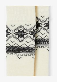 Seleccionado, Off-White