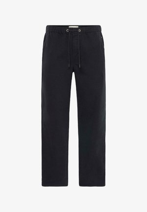 Svarta dragsko byxor med en avslappnad passform, tillverkade av bomullsmaterial. Funktioner inkluderar resårmidja och kontrasterande sömmar.