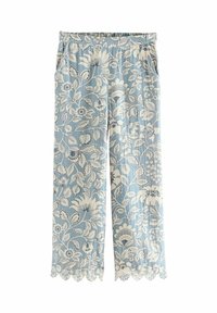 Light blue floral printed pants with an elastic waistband, featuring white and dark blue flowers, and scalloped hem detail.