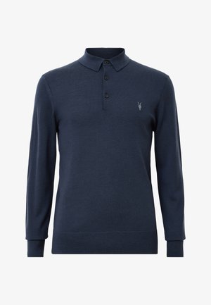 Tummansininen pitkähihaisen polo-paita, joka on valmistettu pehmeästä kankaasta. Paidassa on kauluspääntie, kolme nappia ja brodeerattu logo rinnassa.