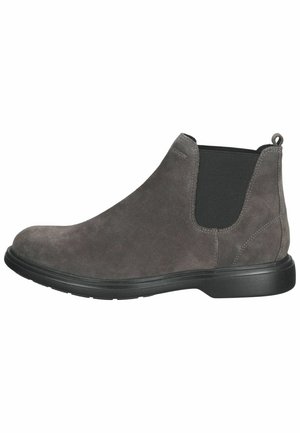 Des bottes cheville en suède grises présentent un design élégant, des panneaux latéraux en élastique et un bout arrondi avec une semelle en caoutchouc texturée. Accent de style minimaliste.