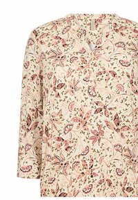 Lehká květinová tunika s krémovým pozadím a růžovými a zelenými botanickými vzory. Vyznačuje se zapínáním u v-neck a rukávy 3/4.