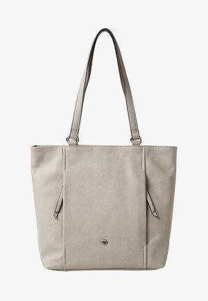 Sac fourre-tout en cuir gris clair avec de longues poignées, surface légèrement texturée, deux fermetures éclair verticales sur les côtés et un petit emblème métallique rond à l'avant.