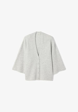 Cardigan gris clair avec un col en V, des manches larges et six boutons sur le devant. Confectionné dans un tissu tricoté doux et texturé.