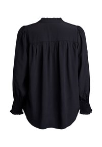 Blusa nera con maniche lunghe a sbuffo, polsini arricciati e giogo posteriore arricciato. Realizzata in tessuto leggero con una vestibilità morbida.