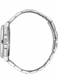 Sido vy av en silverfärgad metalurarmband med länkad band och krona med en trefingerssymbol.