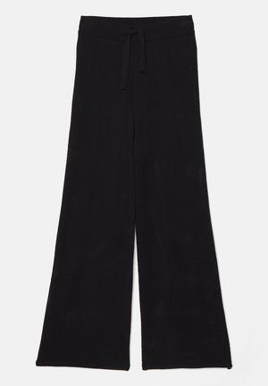 Zwarte, wijde broek gemaakt van mesh-stof met een trekkoord in de taille. De textuur is ademend en lichtgewicht, ideaal voor casual wear.