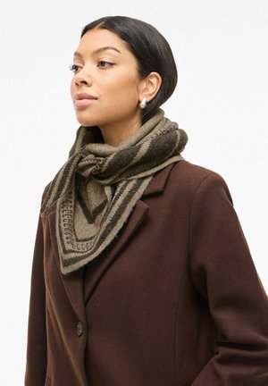 Brown scarf with a triangular design, featuring beige and dark brown stripes. Worn loosely around the neck, fabric appears soft and textured.