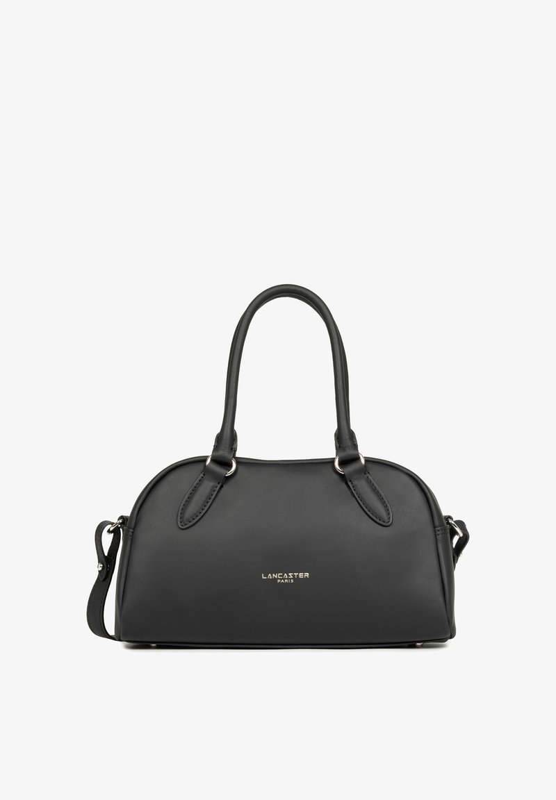 Sac à main en cuir noir Lancaster Paris avec deux poignées et une bandoulière amovible, de forme ovale avec logo doré sur le devant.