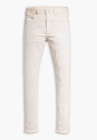 Valkoiset farkut, kapealla istuvuudella, viiden taskun mallilla ja yläpainikkeella suljettavat. Ominaisuuksiin kuuluu hienovarainen ompelu ja metalliset koristeet.