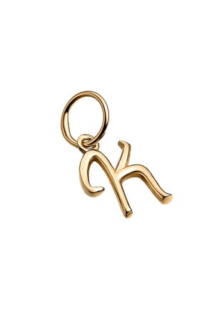 Charm de metal color dorado en forma de una letra "k" estilizada, con un lazo circular para fijar a joyas o accesorios.