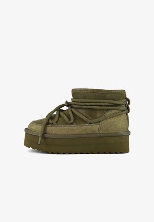 Olive green lace-up ankle boots with a textured upper, a thick platform outsole, and reinforced stitching along the sides.