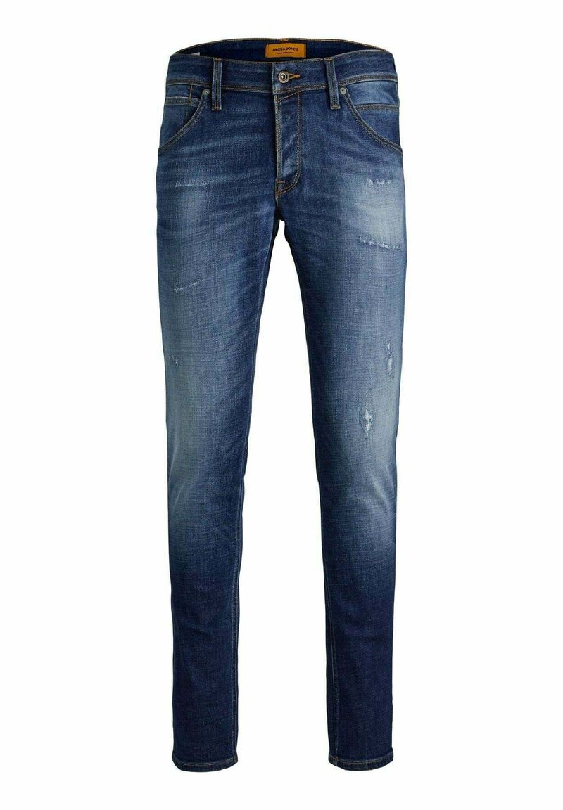 Jeans in denim con un lavaggio medio, con lievi segni di usura, vestibilità affusolata, cinque tasche e dettagli di cucitura in contrasto.