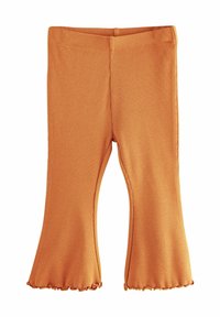 Leggings évasés orange côtelés avec un tissu texturé, dotés d'une taille ajustée et de bords festonnés à l'ourlet.