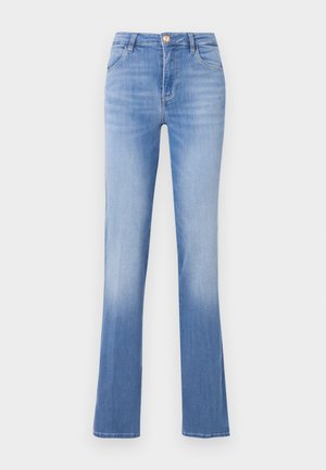 Jeans in denim azzurro chiaro con una forma svasata, design a cinque tasche e chiusura con bottone frontale. Sbiaditi all'orlo per un effetto sfumatura.