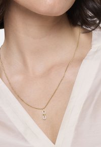 amor Colgante - gold coloured