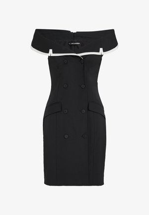 Črna obleka z odprtimi rameni in dvorednim zapenjanjem, z belim robom na ovratniku in zgornjimi žepki na bokih.