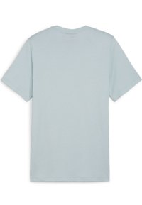 Camiseta de algodón de color azul claro con mangas cortas, un escote redondo y una textura suave; sin logotipos ni patrones visibles. Se muestra la vista trasera.