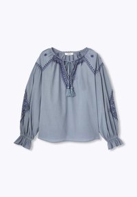 Blouse bleu à manches longues avec des motifs brodés, lien à pompons au niveau du col et poignets élastiques. Tissu doux avec une coupe décontractée.
