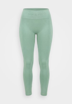 Ανοιχτοπράσινο seamless κολάν Nike Pro με ριμπ υφή και ψηλή μέση με το λογότυπο "NIKE PRO".