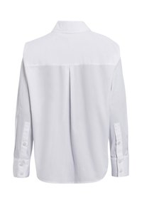White long-sleeve shirt featuring a traditional collar, buttoned cuffs, and a back pleat. Smooth fabric with a clean, tailored design.