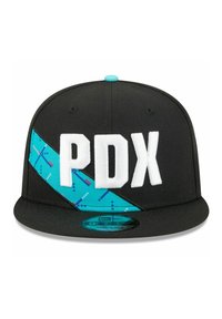 Black snapback cap featuring a blue diagonal band with geometric patterns and white "PDX" lettering. Smooth fabric texture.