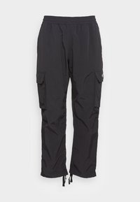 Svarta lätta cargo-byxor med elastisk midja, sidofickor med lock och justerbara snören i bensluten.